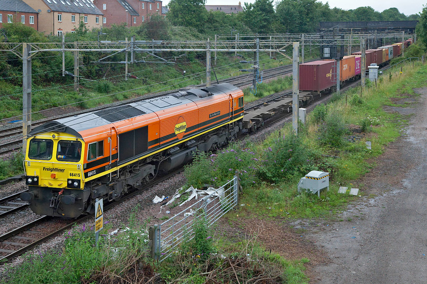 66415, 03.39 Garston-London Gateway (4L32, 9E), site of Roade station 
 With its Freightliner Genesee and Wyoming livery brightening up the dull morning, 66415 'You Are Never Alone' leads the 4L32 03.39 Garston to London Gateway Freightliner past Roade. The Class 66 was named during the autumn of last year (2019) in association with the Samaritans in a short ceremony at Ipswich station, see.... https://www.railadvent.co.uk/2019/11/freightliner-names-locomotive-you-are-never-alone.html 
 Keywords: 66415 03.39 Garston-London Gateway 4L32 site of Roade station You Are Never Alone