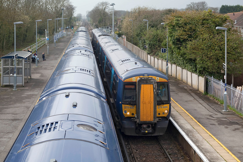 375908, SE 15.17 Ramsgate-London Charing Cross (2W52, RT) & 375620, SE 13.10 London Charing Cross-Ramsgate (2R38, 13L), Minster station 
 A meeting of trains at Minster station. To the left is 375908 working the 15.17 Ramsgate to London Charing Cross whilst 375620 arrives with the 13.10 Charing Cross to Ramsgate. Minster (or Minster Junction as it has been known as in the past) was opened in 1846 by the South Eastern Railway. Like many, it's seen a steady rise in passenger numbers over recent years. 
 Keywords: 375908 2W52 375620 2R38 Minster station