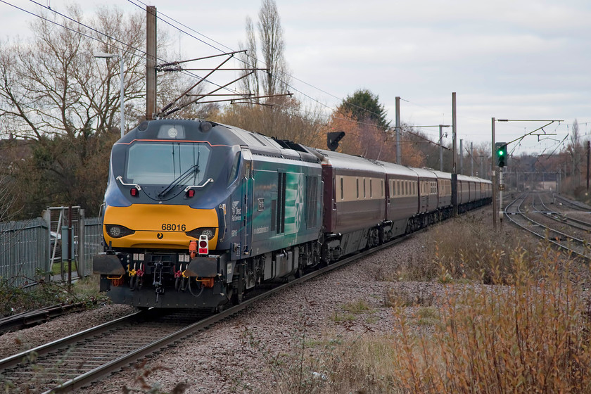 68016, outward leg of The Grassington Dickensian, 08.18 London King`s Cross-Skipton (1Z92), Potters Bar station 
 The Grassington Dickensian railtour leaves Potters Bar station near to the start of its journey from King's Cross to Skipton. Leading the train, out of sight at the front, is 68023 'Achilles' with 68016 'Fearless' swinging about on the rear! People travelling on this railtour will enjoy a fine dining experience during their journey north and than have some hours free wandering around the Skipton Christmas market. 
 Keywords: 68016 The Grassington Dickensian 08.18 London King`s Cross-Skipton 1Z92 Potters Bar station