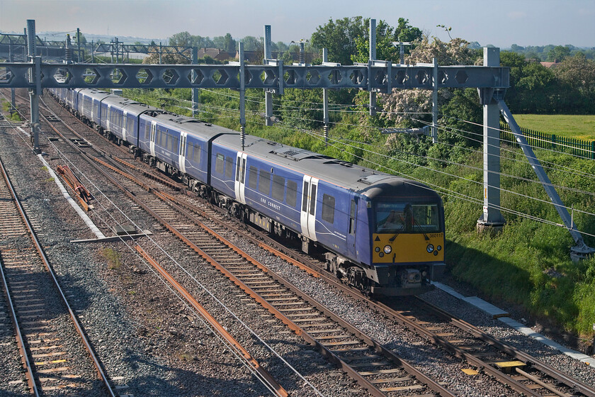 360117 & 360121, EM 08.15 London St. Pancras-Corby (1Y09, RT), Sharnbrook TL001598 
 The new face of the MML, if transient, is seen crossing Sharnbrook Junction in the early morning sunshine. 360117 and 360121 work the 08.15 St. Pancras to Corby train on the down fast line. As can be seen, East Midlands Railway has branded these 'local' services as 'EMR Connect', a simple and clever bit of marketing! 
 Keywords: 360117 360121, EM 08.15 London St. Pancras-Corby 1Y09 Sharnbrook TL001598 EMR Desiro