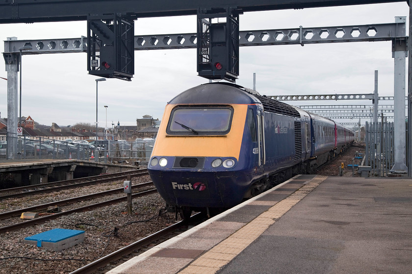 43098, GW 07.48 Paignton-London Paddington (1A12, 2L), Swindon station 
 The previously open feeling at Swindon has been made to feel a little claustrophobic with the arrival of the electrification infrastructure. The over-engineered stanchions have spoilt the scene here and in so many other locations. Thankfully, at least these ghastly structures are not going to blight the scene further west from Chippenham (for the time being at least!). 43098 arrives, leading the 07.48 Paignton to Paddington via Bristol. 43098 was an Eastern Region power car when introduced in the summer of 1978 as part of set 254022. 
 Keywords: 43098 1A12 Swindon station