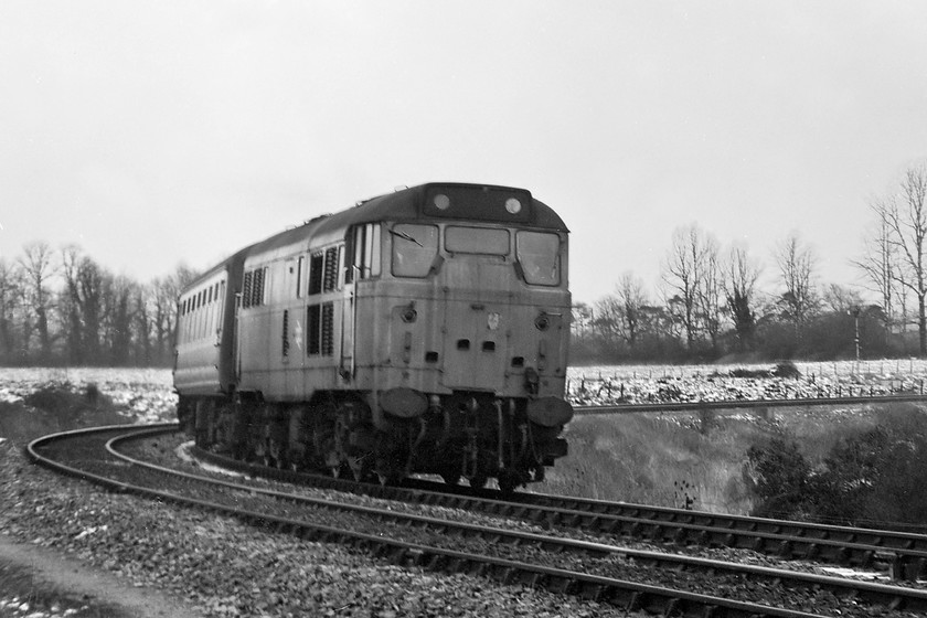 31421, unidentified Weymouth-Bristol Temple Meads working, Bradford North Junction 
 An old favourite in the Bristol and Westbury area was 31421 that could regularly be seen working along the Avon Valley. Here, it leads an unidentified Weymouth to Bristol Temple Meads service past Bradford Junction just north of Trowbridge. The picture is taken from Bradford North Junction that I was given permission to access by the signalman in Bradford Junction signal box. 
 Keywords: 31421 Weymouth-Bristol Temple Meads working Bradford North Junction