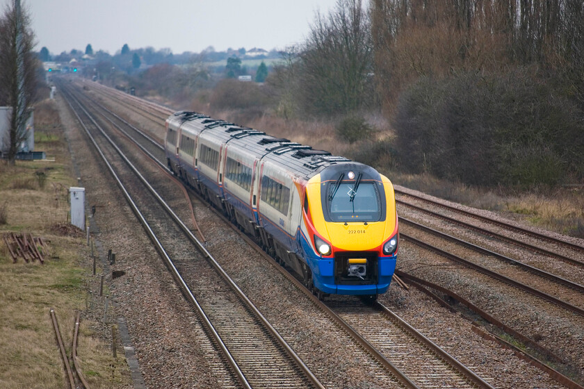 222014, EM 11.02 Nottingham-London St. Pancras, Lower Farm Road, Bromham TL028518 
 EMR's 222014 is seen heading south just north of Bedford working the 11.02 Nottingham to London St. Pancras service. This is the last few miles of four-track railway from London before becoming three-track from Sharnbrook Junction but there appear to be plans afoot to reinstate the fourth line, possibly as far as Kettering. 
 Keywords: 222014 11.02 Nottingham-London St. Pancras, Lower Farm Road Bromham TL028518 EMR East Midlands Railway Meridian