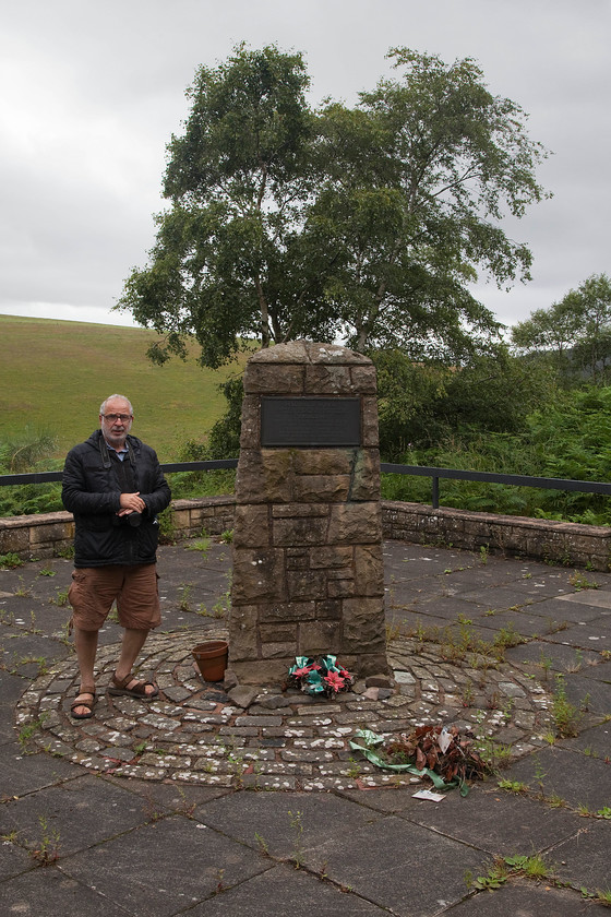 Andy paying his respects, Penmansheil memorial NT796670 
 Above the course of the now-closed and permanently sealed up Penmansheil tunnel is a small memorial to the two men who died in the tragedy. Andy pays his respects to them; rest in peace Gordon Turnbull and Peter Fowler. 
 Keywords: Andy paying his respects Penmansheil memorial NT796670