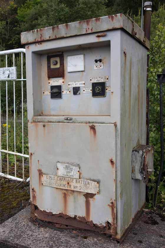 Ex DMU battery charger, Buxton station 
 A reminder of times past when the first generation DMUs will have sat stabled at Buxton station and had their batteries charged. Quite why this charger has not been removed remains a mystery as its not exactly an attractive feature of platform one! 
 Keywords: Ex DMU battery charger Buxton station