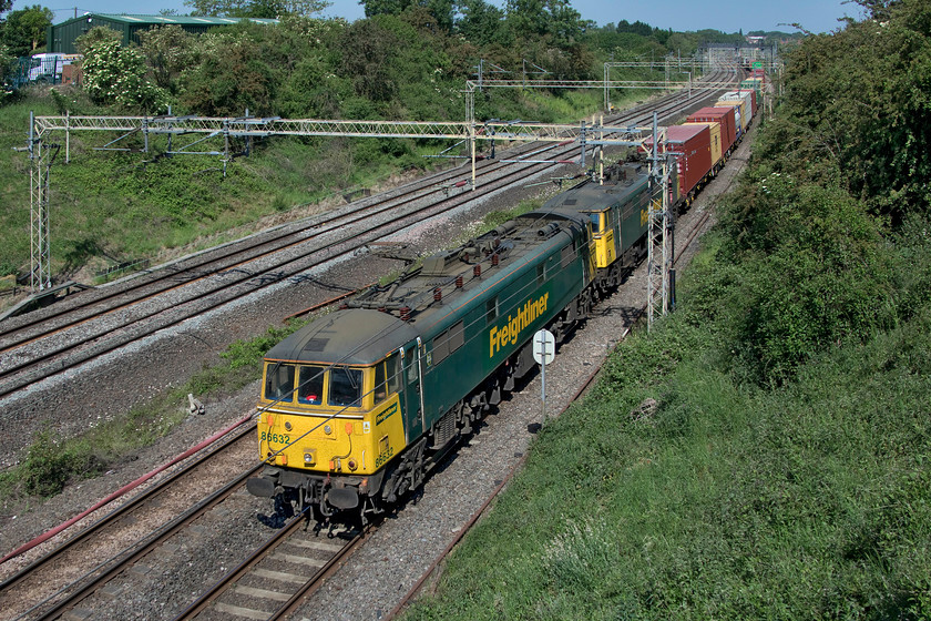 86632 & 86609, 08.25 Crewe Basford Hall-Felixstowe North (4L93, 1L), Victoria bridge 
 The second up double-headed Freightliner of the day hauled by a pair of AL6 Class 86s. 86632 and 86609 lead the 08.25 Crewe Basford Hall to Felixstowe 4L93 past Victoria bridge. With possibly just a few months left in service, I take every opportunity to photograph their activity prior to replacement by the former Greater Anglia Class 90s that Freightliner has just acquired. 
 Keywords: 86632 86609 08.25 Crewe Basford Hall-Felixstowe North 4L93 Victoria bridge AL6 Freightliner Cans