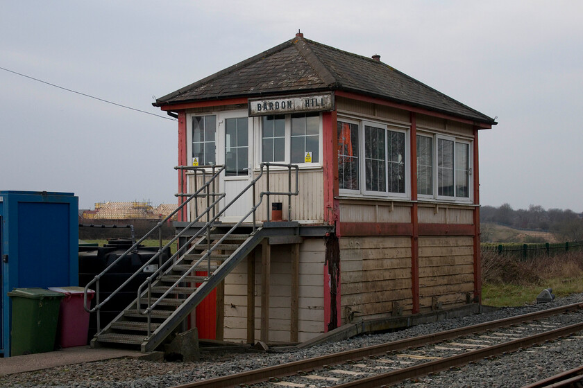 Bardon Hill signal box (Mid, 1899) 
 My first signal box cop of the day and it's only just over fifty miles from home! Bardon Hill box is on the freight-only section of the line from Leicester to Burton-on-Trent and controls the regular aggregate trains that enter and leave the nearby quarry. The Midland box that dates from 1899 is in a shocking state with much rotten timber work in evidence. The rear is supported by a huge steel lintel that is itself attached to a pair of steels buried in the ground. This makes me wonder how much time it has left in service? 
 Keywords: Bardon Hill signal box Midland Railway 1899