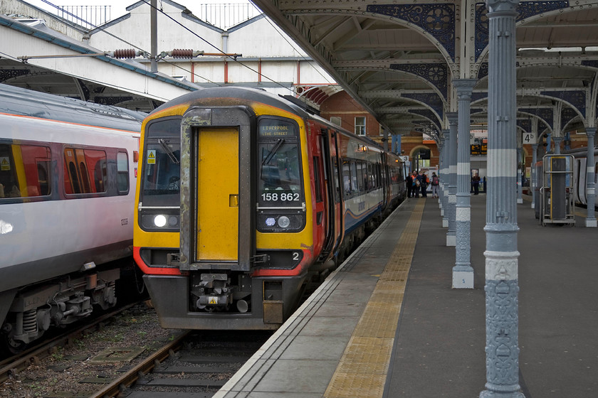 158862, EM 10.57 Norwich-Liverpool Lime Street (1R82), Norwich station 
 A two-car train working the 1R82 10.57 Norwich to Liverpool Lime Street; is this what our privatised railway has really come to? 158862 waits to leave Norwich's platform three with the East Midlands Trains service. 
 Keywords: 158862 10.57 Norwich-Liverpool Lime Street 1R82 Norwich station East Midlands Trains EMT