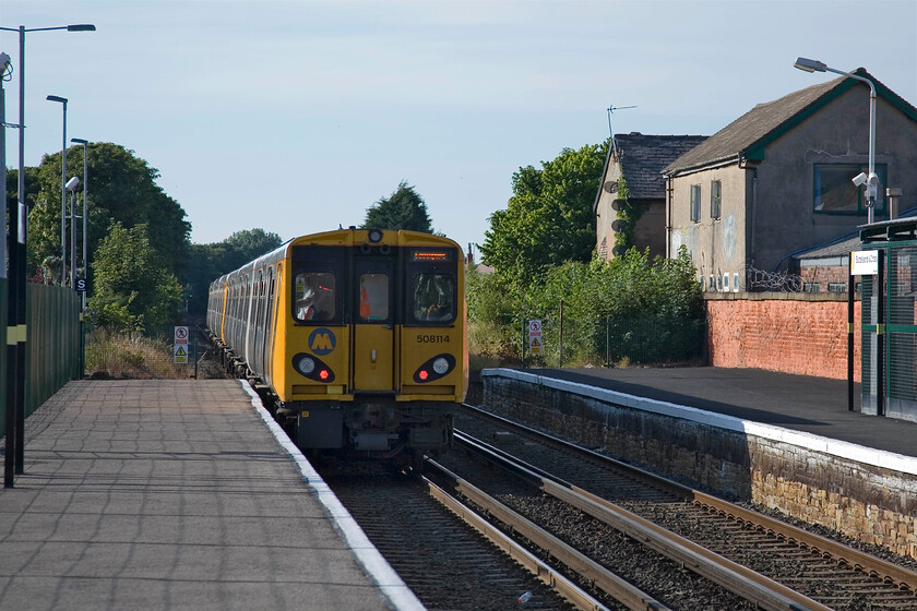 508114, ME 18.13 Liverpool Central-Southport, Blundellsands & Crosby station 
 508114 departs from Blundellsands & Crosby station working the 18.13 Liverpool Central to Southport service. Approaching 17.00 and we are still on Merseyside so it was time for us to head for home with just one more signal box to do! 
 Keywords: 508114 18.13 Liverpool Central-Southport Blundellsands & Crosby station Merseyrail