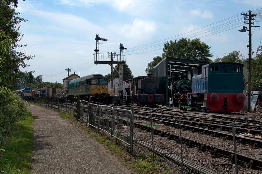 Various locomotives & stock, Pitsford & Lamport station 
 The general scene at Pitsford and Brampton station, the home to the Northampton and Lamport Railway. Unfortunately, for some time now they have been unable to operate any of their steam locomotives due to various issues, however, in May 0-4-0 saddle tank 7063 Eustace Forth arrived on-loan from the 7063 Locomotive Group. 7063 is seen inside the recently constructed locomotive shed with another new arrival, Andrew Barclay 0-4-0 former Irchester No.9 that locals will recall as being on-display at Wicksteed Park in Kettering for many years. 
 Keywords: Various locomotives stock Pitsford & Lamport station