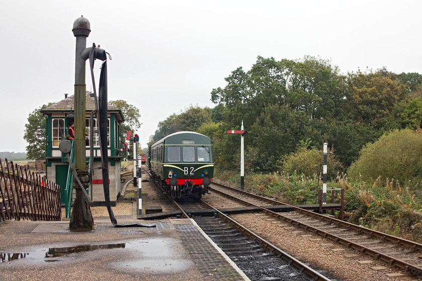 M51192 & M56352, 12.15 Holt-Sheringham, Holt station 
 M51192 and M56352 leave Holt station past the signal box with the 12.15 to Sheringham. Whilst I like the work and attention to detail that the North Norfolk Railway work towards, I think that the breeze block base to the signal box looks a little disappointing. It has been in this as-built condition for a number of years now and really could do with some cladding to make it look more authentic. 
 Keywords: M51192 M56352 12.15 Holt-Sheringham Holt station