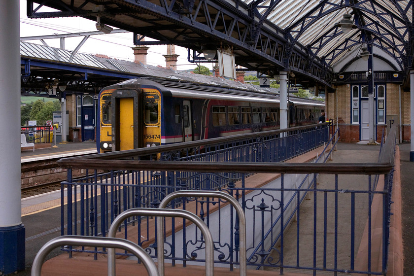 156474, SR 12.21 Glasgow Queen Street-Oban & Mallaig (1Y24, 4L & 4L), Dumbarton Central station 
 Dumbarton Central station is an impressive structure built atop the surrounding streets. Its architecture is in the classic Caledonian and Dumbartonshire Junction style being opened in 1850. I last visited the station in May 1977 as a young spotter and remember seeing two class 27s working trains to the Isles. Here, 156474 arrives into the station with the 12.21 Queen Street to Oban and Mallaig. Despite being a six-car unit, it was packed and so it was a good job we were only going as far as Hellensburgh Upper. 
 Keywords: 156474 1Y24 Dumbarton Central station