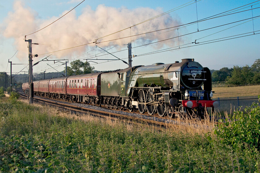 60163, return leg of The Cheshireman, 16.13 Chester-London Euston (1Z65, 2L), Milton Malsor SP737561 
 Looking its usual resplendent self 60163 'Tornado' climbs hard away from Northampton at Milton Malsor leading the return Cheshireman charter. Running as 1Z65 the train left Chester at 16.13 and was heading back to London Euston. This charter was to have run two days later on the coming Saturday but due to operational difficulties, it was brought forward. It is remarkable to think that 'Tornado' has been on the mainline for thirteen years now; where has all that time gone? 
 Keywords: 60163 The Cheshireman, 16.13 Chester-London Euston 1Z65 Milton Malsor SP737561 Tornado