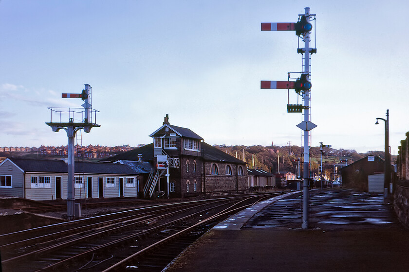 Whitby station & signal box (NER, 1876) 
 Before British Rail's dramatic and comprehensive massacre of the signalling and trackwork around Whitby the scene was far more interesting! With this view dominated by Whitby's NER 1876 signal box and its conjoined good shed there were many semaphores and a lot of trackwork with three platforms rail connected. However, in truth by this time at the end of 1981 only platform two was in use witnessed by the rusty railheads nearest to the camera on platform one. Had I known of the impending decimation, I would have taken a few more images during this visit. 
 Keywords: Whitby station & signal box NER North Eastern Railway