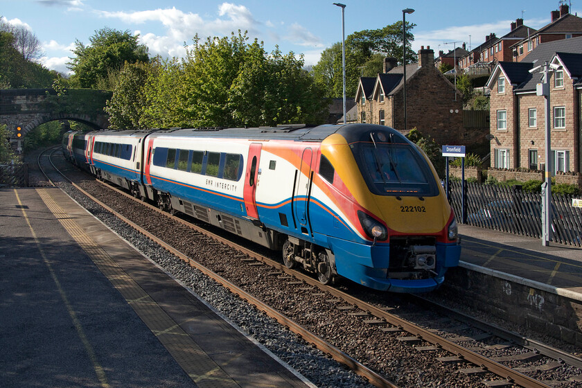 222102, EM 17.33 Sheffield-London St. Pancras (1C80, RT), Dronfield station 
 On our way home from South Yorkshire in Andy's ageing but trusty Nissan Micra (2002 vintage), we dived off the M1 as Andy needed to visit a couple of stations yet to be underlined in his rail atlas. By the time we reached Dronfield on the MML the evening sun had come out and 222102 is captured passing at speed with the 17.33 Sheffield to St. Pancras service. 
 Keywords: 222102 17.33 Sheffield-London St. Pancras 1C80 Dronfield station EMR East Midlands Railway Meridian