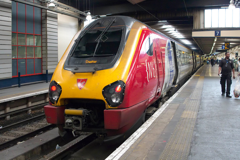 221106, VT 11.10 London Euston-Chester (1D85, 2E), London Euston station 
 Virgin West Coast 221106 'Willem Barents' waits on the blocks at Euston ready to work the 1D85 11.10 to Chester. Having an engine under each coach means that a fair amount of exhaust is emitted especially when in confined spaces such as here at Euston. The same issues occurs at the recently re-built Birmingham New Street that suffers from exhaust fume issues in the upper concourses. 
 Keywords: 221106 1D85 London Euston station