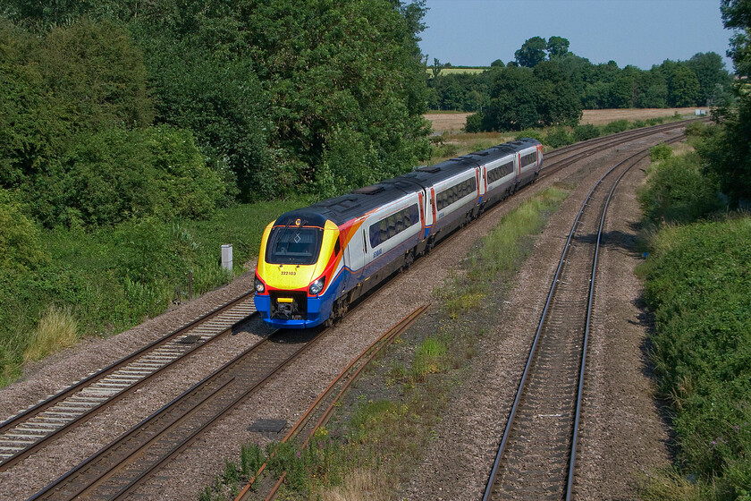 222103, EM 08.49 Sheffield-London St. Pancras (1C27), Finedon Road industrial estate SP900702 
 222103 approaches Wellingborough from the north working the 08.49 Sheffield to St. Pancras EMT service. This spot, despite appearances, is not as rural as it appears. Behind me is the large Finedon Road industrial estate complete with the municipal tip very close by! 
 Keywords: 222103 08.49 Sheffield-London St. Pancras 1C2 Finedon Road industrial estate SP900702 East Midlands Trains Meridian