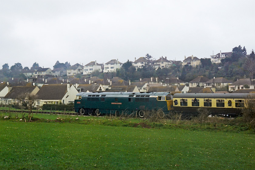 D1013, 14.30 Paignton-Kingswear, Broadsands SX893574 
 A going-away shot of D1013 'Western Ranger' taking the 14.30 Paignton to Kingswear past Broadsands near to Churston in south Devon. The red nameplates, unique to D1013, enhance the looks of this fine looking locomotive complete with its white lined wheels. 
 Keywords: D1013 14.30 Paignton-Kingswear Broadsands SX893574