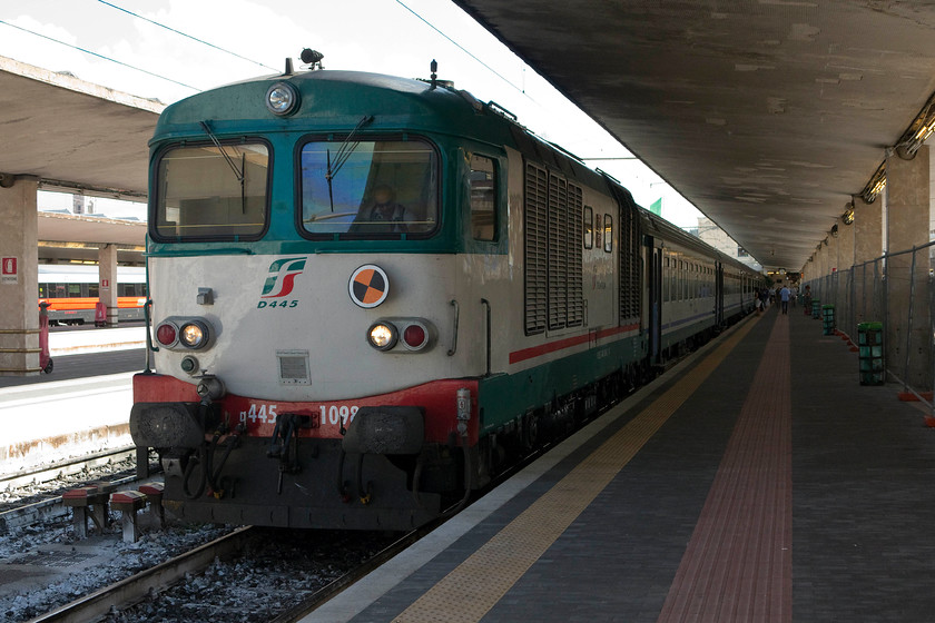 445.1089, 14.10 Florence SMN-Siena (11779), Florence SMN station 
 445.1089 is one of the third generation of Fiat built class of diesels that are operated by Ferrovie dello Stato (FS). There are around 170 of the class in service that were built between 1974 and 1988. It is seen here waiting at Florence SMN station to leave with the 11779 service, the 14.10 to Siena. 
 Keywords: 445.1089 14.10 Florence SMN-Siena 11779 Florence SMN station