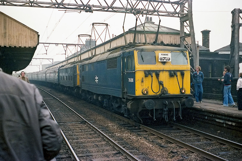 76016 & 76009, outward leg of the Pennine Explorer, Cardiff Central-Rotherwood, Penistone station 
 The second photo-stop of the Pennine Explorer was at Penistone station. Here, I have not been very successful in getting a shot free of people but it goes to show how busy the station must have been. It shows 76016 and 76009 leading the outward leg of the railtour Manchester Piccadilly to Rotherwood exchange sidings. I am a little confused by the position of the train in this image. In other pictures I have seen the train stopped much further forward than shown here right near to the junction with the Huddersfield line. Did the train set back or pull forward, perhaps to allow passengers from the rear coaches to alight? 
 Keywords: 76016 76009 Pennine Explorer Cardiff Central-Rotherwood Penistone station