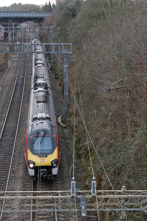 Class 221, 11.10 London Euston-Chester (1D85, RT), Hyde Road bridge 
 An unidentified class 221 heads north about to pass under Roade's Hyde Road bridge. It is working the 1D85 11.10 Euston to Chester and is my first picture of a Voyager in the new flowing silk livery. 
 Keywords: Class 221 11.10 London Euston-Chester 1D85 Hyde Road bridge