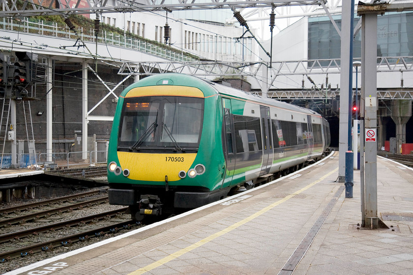 170503, LM 14.15 Walsall-Birmingham New Street (2A64), Birmingham New Street station 
 Seen earlier at Bescot Stadium station, 170503 arrives in to New Street station working the terminating 14.15 2A64 from Walsall. 
 Keywords: 170503 14.15 Walsall-Birmingham New Street 2A64 Birmingham New Street station