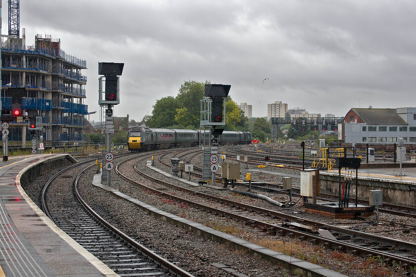 43040 & 43098, GW 05.40 Penzance-Cardiff Central (2U10, 1E), Bristol Temple Meads station 
 The 2U10 05.40 Penzance to Cardiff central leaves Bristol Temple Meads worked by 43040 'Berry Pomeroy Castle' at the rear and with 43040 'Walton Castle' leading. The scene at the eastern end of Temple Meads has changed over the years with recent developments to my left transforming its appearance. However, one thing that has not changed is the delightful Bristol TM East GF (Ground Frame) seen to the right. Quite how this has survived over the years is a surprise being such an anachronistic piece of infrastructure that I photographed looking exactly the same back in 1977, see...... https://www.ontheupfast.com/p/21936chg/23615765204/you-can-see-that-this-negative-has 
 Keywords: Walton Castle 43040 & 43098, GW 05.40 Penzance-Cardiff Central (2U10, 1E), Bristol Temple Meads station Berry Pomeroy Castle GWR HST Castle set