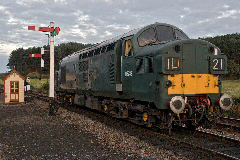 D6732, going on-shed, Weybourne station 
 Having operated passenger services throughout the day on the North Norfolk Railway, D6732 has just returned light engine from Sheringham. It is seen at Weybourne slowly crossing to the 'wrong' platform in order to then reverse and access the yard. The formally numbered 37032 is a stalwart on the line that can be found regularly operating passenger services throughout their operating season. 
 Keywords: D6732 Weybourne station 37032