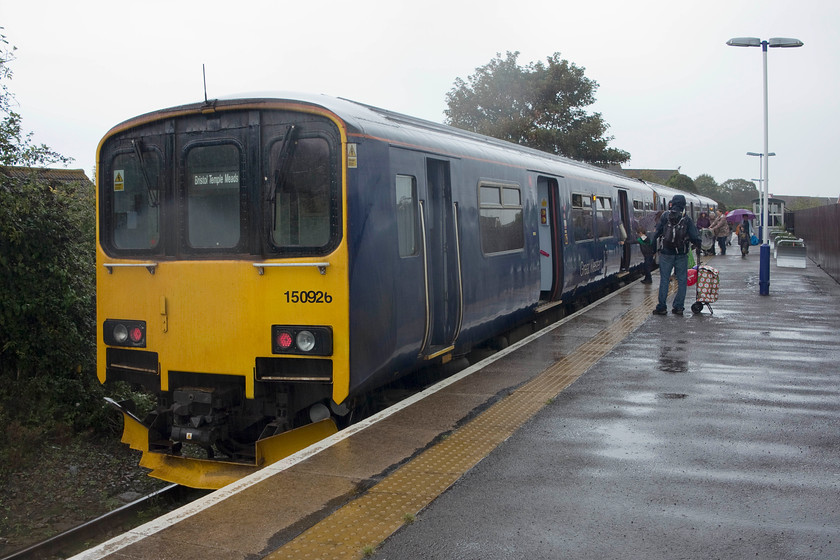 150926, GW 13.54 Severn Beach-Bristol Temple Meads (2K25), Severn Beach station 
 The arrival at a rather desolate Severn Beech station coincided with a torrential rainstorm. I dashed from the train to take a picture of 150926 it before it returned as the 13.54 to Bristol Temple Meads. On the return journey there was a children's party in full swing complete with cake, drinks and presents. All very nice for the dozen youngsters but the noise level was best described as excitable! It's nice that TOCs such as FGW permit and encourage such activities and that the on-board staff got involved in the fun! 
 Keywords: 150926 13.54 Severn Beach-Bristol Temple Meads 2K25 Severn Beach station