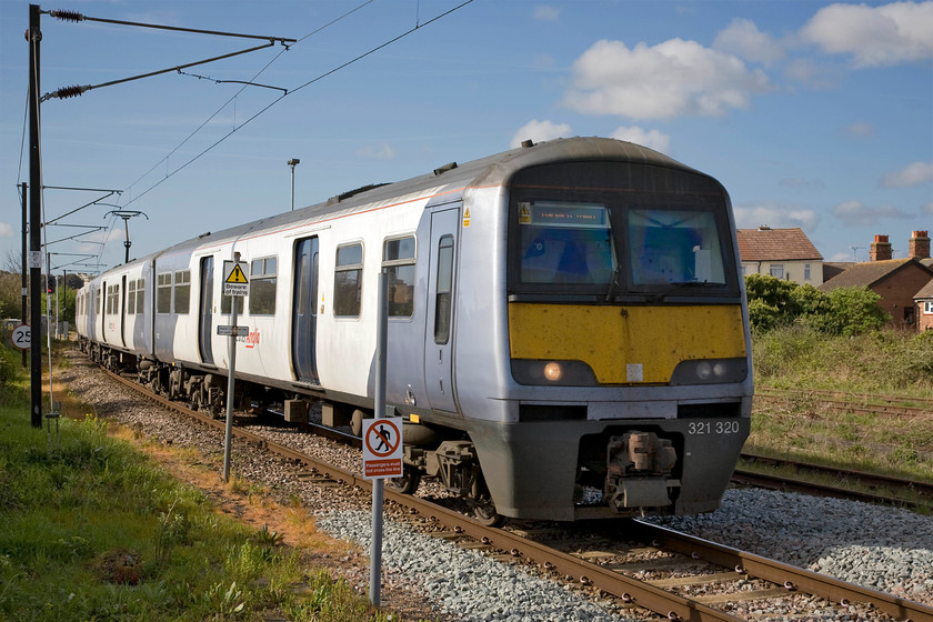 321320, LE 09.00 Manningtree-Harwich Town (2A10), Harwich Town station 
 321320 drifts into Harwich Town station with the 09.00 Abellio Greater Anglia service from Manningtree. This unit will make a number of trips between the two stations stopping at all the intermediate ones throughout the day working the route dubbed the Mayflower Line. 
 Keywords: 321320 09.00 Manningtree-Harwich Town 2A10 Harwich Town station Mayflower Line