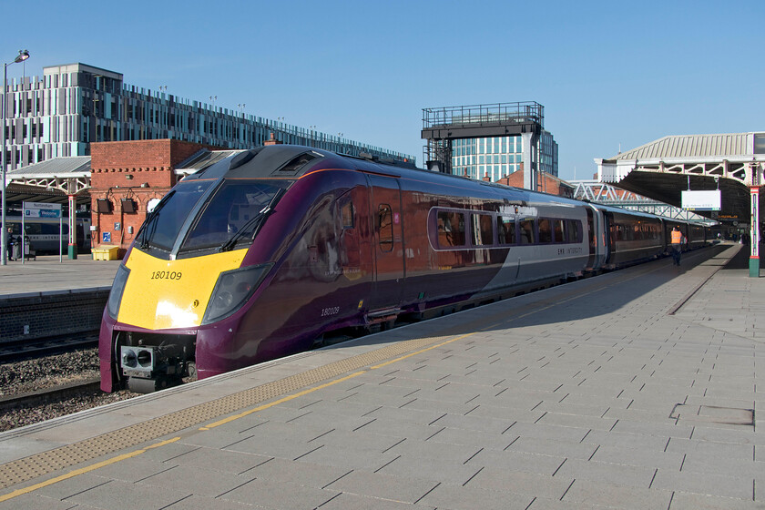 180109, EM 07.35 London St. Pancras-Nottingham (1D09, RT), Nottingham station 
 We travelled from Wellingborough to Nottingham aboard one of EMR's newly acquired Class 180s. These units, dating from the early 2000s, are a member of the Coradia family of DMUs and have been the hot potatoes of the TOCs that have been involved with their operation! Never the most reliable of units they have been through the hands of many operators never being used for very long and the same is still true today. In its latest guise 180109 now wears its smart-looking EMR livery as it stands at Nottingham station. We had just arrived on this train having joined it at Wellingborough working the 07.35 St. Pancras to Nottingham service. With the new-build bi-modes well underway the use of the 180s is going to be short-lived so one can only wonder where they will go next if anywhere? 
 Keywords: 180109 07.35 London St. Pancras-Nottingham 1D09 Nottingham station EMR East Midlands Railway