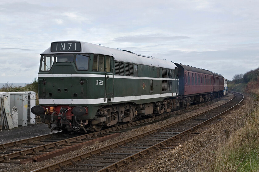 D5631, stabled, Weybourne Yard 
 From the start of dieselisation, the A1A A1A Type 2s were synonymous with the Eastern Counties and found in the livery as demonstrated here by D5631. This locomotive is a regular performer on the North Norfolk Railway being versatile and reliable. It is a distinct possibility that it would have worked along the former M&GNR route between Sheringham and Norwich via Melton Constable before the route closed passing where it is now stabled in Weybourne Yard. 
 Keywords: D5631 stabled Weybourne Yard A1A A1A Class 31