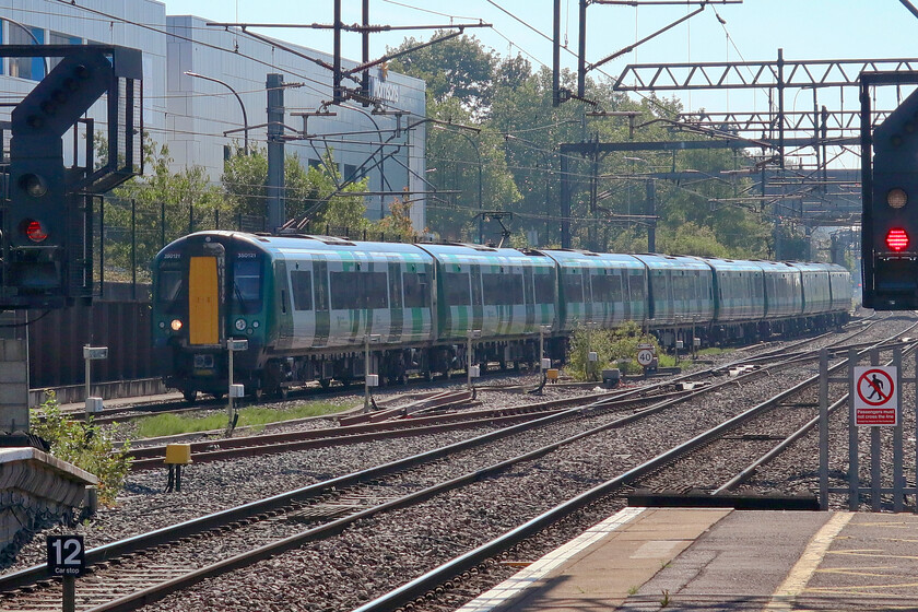 350121, LN 10.26 London Euston-Milton Keynes Central (1K27, RT), Milton Keynes Central station 
 Due to the closure of the slow lines from Hanslope to Northampton station due to the installation of pointwork and signalling for access to the SERGO logistics park a shuttle service was in operation between Milton Keynes and London. For passengers to Wolverton and Northampton (and beyond), a bustitution arrangement was in place. One of the regular train shuttles arrives at Milton Keyes worked by 350121, the 1K27 10.26 ex Euston. 
 Keywords: 350121 10.26 London Euston-Milton Keynes Central 1K27 Milton Keynes Central station London Northwestern Desiro