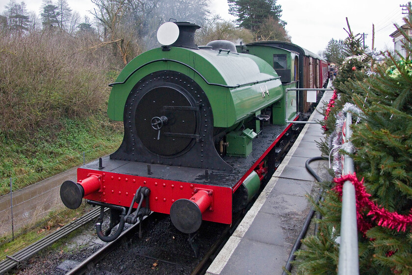 4, 14.00 Pitsford & Brampton return, Pitsford & Brampton station 
 On a grim New Year's Day Swanscombe No.4 or 3718 to give it its proper number waits at Pitsford and Brampton station. Soon it will work the 14.00 return departure that my wife and I would travel on enjoying a seasonal mince pie and drink. Despite the awful weather it was good to see so many people out visiting our local heritage railway helping to keep things going through 2025. 
 Keywords: Number 4 14.00 Pitsford & Brampton return Pitsford & Brampton station NLR Northampton ad Lamport Railway