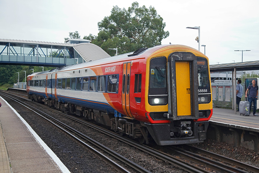 158888, SW 17.07 Romsey-Salisbury (via Southampton) (2S51, 5L), Southampton Airport Parkway station 
 Southampton Airport Parkway station was very busy! It felt a little too crowded with all the passengers and their luggage and the platforms being on the narrow side. Its usage numbers are steadily on the rise and I see no reason why this should not continue. Here, 158888 arrives with the 17.07 Salisbury to Romsey via. Southampton. 
 Keywords: 158888 2S51 Southampton Airport Parkway station