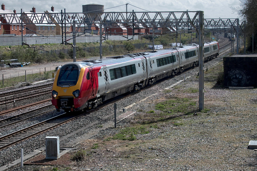 221118, VT 11.40 London Euston-Wolverhampton (9G06, 2E), site of Roade station 
 Having only commented last weekend that Avanti West Coast appeared to be only using their Voyager units on services that travel away from the wires here is an example proving that this is not the case! Why with all the spare capacity due to the massively reduced COVID-19 timetable is 221118 being used on the 11.40 Euston to Wolverhampton? The 9G06 is seen passing the site of Roade station. 
 Keywords: 221118 11.40 London Euston-Wolverhampton 9G06 site of Roade station Avanti West Coast Voyager