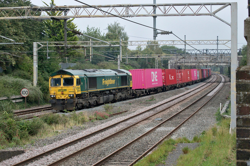 66956, 09.25 Southampton MCT-Garston (4L28, 28E), site of Castlethorpe station 
 The Singaporean container operator ONE has only been in operation for two years but its boxes certainly stand out on a mixed train such as this! 66596 leads the 09.25 Southampton MCT (Maritime Container Terminal) to Garston past Castlethorpe between Wolverton and Hanslope Junction. 
 Keywords: 66956 09.25 Southampton MCT-Garston 4L28 site of Castlethorpe station Freightliner