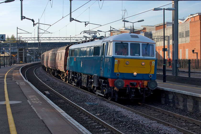 86259, outward leg of The Cumbrian Mountain Express, 07.10 London Euston-Carlisle (1Z86), Wolverton station 
 86259 'Les Ross/Peter Pan' leads the outward leg of The Cumbrian Mountain Express running as 1Z86 from Euston to Carlisle. The train is seen passing through Wolverton station, a spot that I rarely photograph at even though it is only a short distance from home. 
 Keywords: 86259 The Cumbrian Mountain Express 07.10 London Euston-Carlisle 1Z86 Wolverton station