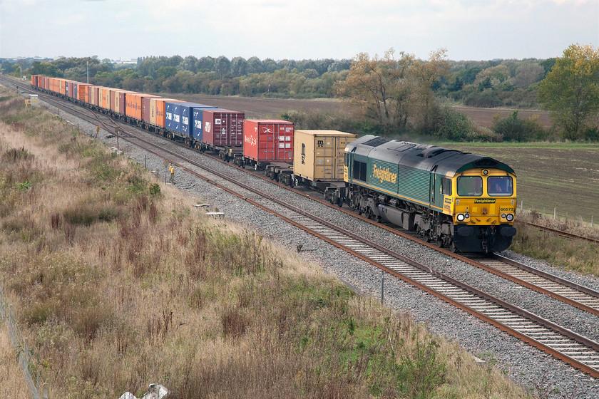 66572, 10.58 Bristol FLT-Tilbury (4L32), Bourton SU228874 
 With just three spaces, the daily 10.58 Bristol FLT to Tilbury Freightliner is almost completely full. 66572 will be doing its best to keep things moving so as not to hold up the following passenger services. There are a number of loops between here and Didcot, where the GWML become four-track, so slower trains can be held until there is a gap in traffic. 
 Keywords: 66572 10.58 Bristol FLT-Tilbury 4L32 Bourton SU228874