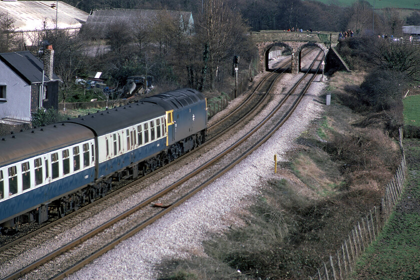 47106, 12.25 Crewe-Cardiff Central (1V05), Careleon ST330923 
 Class 47s were not uncommon working services between Crewe and Cardiff during the early 1980s prior to the introduction of the Class 33s on the route. The 1V05 12.25 Crewe to Cardiff Central service approaches Caerleon where the train is about to make a one hundred and eighty-degree turn to join the South Wales mainline at Maindee Junction prior to entering Newport. The train is being led by steam heat 47106 that had seven years in service prior to its withdrawal after sustaining accident damage after a collision with classmate 47140 in February 1988. Both locomotives ended up at Vic Berry's in Leicester for disposal. 
 Keywords: 47106 12.25 Crewe-Cardiff Central 1V05 Caerleon ST330923 Duff