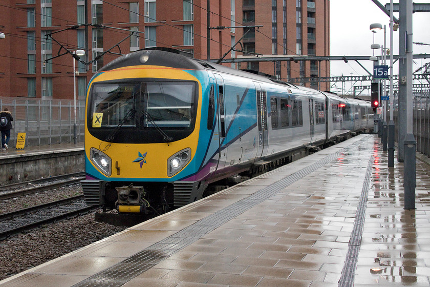 185135, TP 14.25 Liverpool Lime Street-Newcastle (Cancelled from Darlington) (9E14, 2L), Leeds station 
 Having arrived at Leeds and deposted my bag at our hotel, I returned to the station to make the relatively short journey to York. I travelled on 185135 working the 14.25 Liverpool Lime Street to Newcastle that is seen here entering Leeds station. I find these units roomy and comfortable with rapid acceleration provided by their 750 hp Cummins QSK19 engines. This service, along with all others heading north of York, were badly effected by a death on the line at Chester-Le-Street, in this particular case the Trans Pennine train was terminated at Darlington. 
 Keywords: 185135 14.25 Liverpool Lime Street-Newcastle 9E14 Leeds station