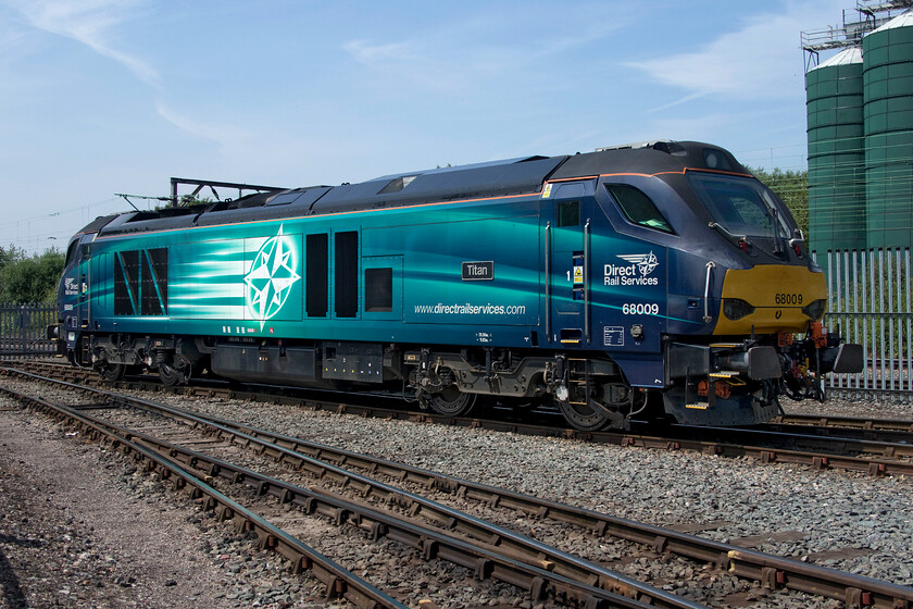 68009, on display Crewe Gresty Bridge 
 68009 'Titan' looks very smart on display at Crewe Gresty Bridge as it basks in the summer sunshine. It is hard to believe that this locomotive is coming up for ten years old now......where has that time gone? 
 Keywords: 68009 Titan on display Crewe Gresty Bridge