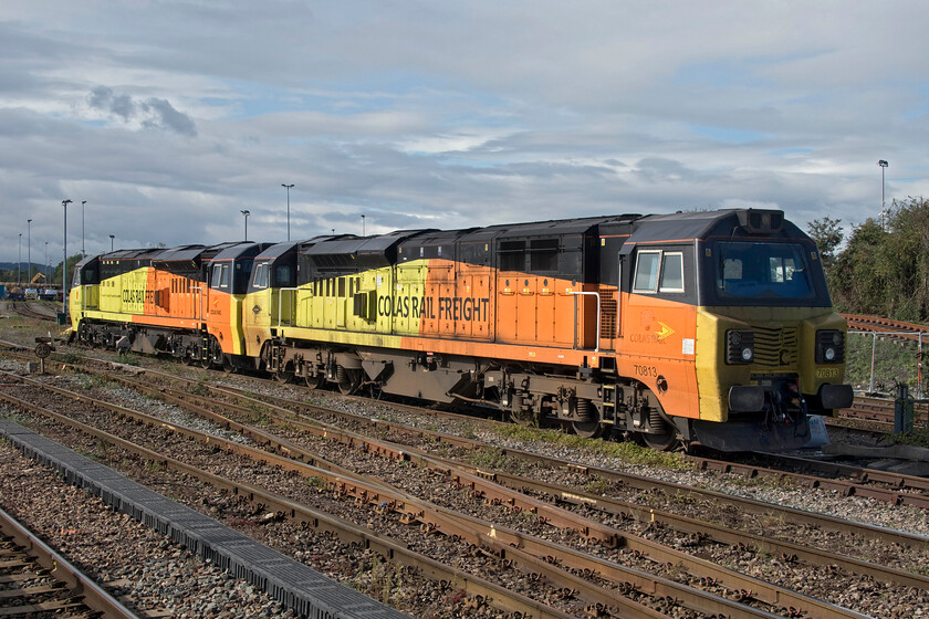 70813 & 70811, running round, Westbury station 
 A further two members of the thirty-seven strong Class 70s run round at Westbury to position themselves for infrastructure duties. 70813 and 70811 are operated by Colas Railfreight adorned in their rather garish livery that certainly stands out! Living close to the WCML in Northamptonshire Class 70s are not a particularly common sight leaving me with a bit of a dearth when it comes to photographs of them and I know that my long time railway companion, Andy, is in the same situation; perhaps we need some more visits to Westbury! 
 Keywords: 70813 70811 Westbury station Colas Railfreight