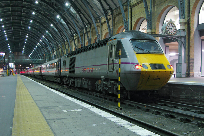 43316, GR 22.00 London King's Cross-Leeds (1D34), London King's Cross station 
 In a nod to one of my early photographic styles, I have adopted this low-down view at Kings's Cross station of the rear of the 22.00 departure to Leeds. Back in the 1970s, I seemed to favour this particular position for a number of my photographs, for example, see... https://www.ontheupfast.com/p/21936chg/25304839604/x55021-1000-london-kings-cross-edinburgh that was also taken a King's Cross back in 1978. HST power car 43316 will power at the rear of the train that is the final down departure from London to Leeds of the day. 
 Keywords: 43316 22.00 London King's Cross-Leeds 1D34 London King's Cross station National Express East Coast