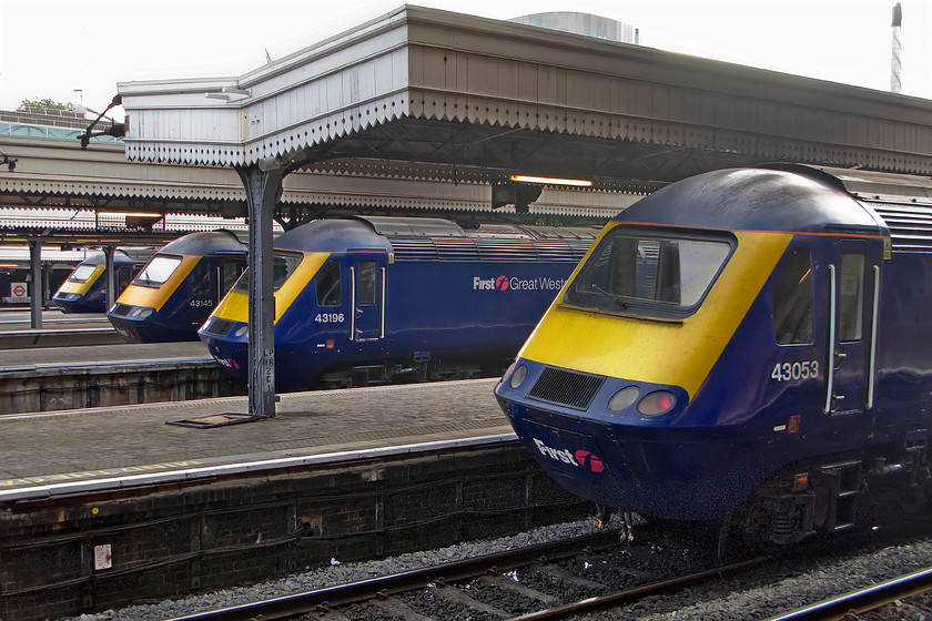 43040 (1B15), 43145 (1G11), 43196 (1C75), 43053 (1U06), London Paddington station 
 A classic line up of HSTs at London Paddington station; a scene set to change over the coming few years with the arrival of brand new shiny electric units. From left to right in this line up is....

43040 'Bristol St. Philips Marsh', 08.45 London Paddington-Swansea (1B15)
43145, 08.15 London Paddington-Swansea (1G11)
43196, 08.30 London Paddington-Paignton (1C75)
43053 'University of Worcester', 08.30 London Paddington-BathSpa (1U06) 
 Keywords: 43040 Bristol St. Philips Marsh 08.45 London Paddington-Swansea 1B15 43145 08.15 London Paddington-Swansea 1G11 43196 08.30 London Paddington-Paignton 1C75 & 43053 08.30 London Paddington-Bath Spa 1U06 London Paddington station University of Worcester