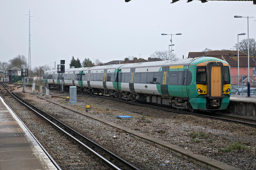 377122, SN 12.02 London Victoria-Portsmouth Harbour, Havant station 
 Having reached the south coast following the line down from London we were now able to enjoy Southern services traversing the 'coastway' route to and from Brighton (and beyond). Electrostar 377122 arrives at Havant working the 12.02 Victoria to Portsmouth Harbour service that had headed southwest from the capital via the Dorking and Horsham route. 
 Keywords: 377122 12.02 London Victoria-Portsmouth Harbour Havant station Southern Electrostar