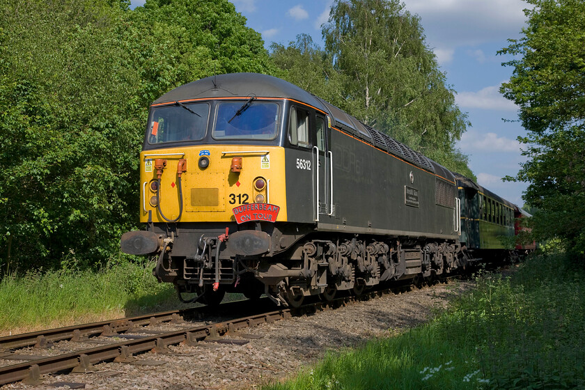 56312, 15.30 Peterborough NV-Wansford (1M52), Ferry Meadows TL153970 
 As one of the very earliest Class 56s 56003 arrived in the UK in February 1977 and as a portent of things to come it was constructed away from our shores by Electroputere in the Romanian city of Craiova. In September 2008 it was renumbered 56312 and has since been named 'Jeremiah Dixon Son of County Durham Surveyor of the Mason-Dixon Line USA' (to give it its full name!). Now wearing its rather drab DCR colour scheme it approaches Ferry Meadows leading the 15.30 Peterborough Nene Valley to Wansford service. 
 Keywords: 56312 15.30 Peterborough NV-Wansford 1M52 Ferry Meadows TL153970 Jeremiah Dixon