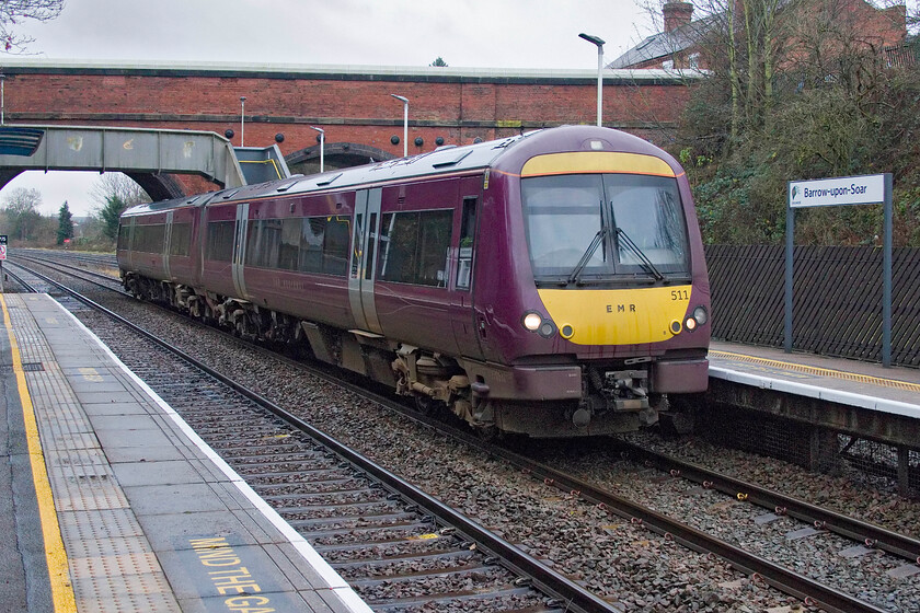 5. 170511, EM 10.43 Leicester-Lincoln Central (2L65, 4L), Barrow-on-Soar station 
 170511 arrives at Barrow-on-Soar station working the 10.43 Leicester to Lincoln Central service. The bridge in the background was the one that partially collapsed in August 2016 during Network Rail maintenance that blocked the up and down fast lines the arch of which can be seen to the right above the leading car of the unit 
 Keywords: 170511 10.43 Leicester-Lincoln Central 2L65 Barrow-on-Soar station EMR East Midlands Railway Turbostar