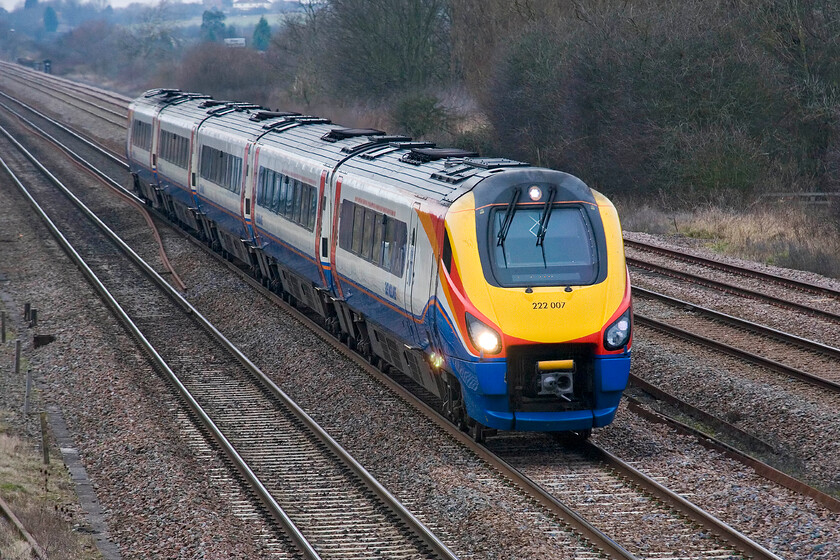 222007, EM 12.17 Corby-London St. Pancras, Lower Farm Road, Bromham TL028518 
 The 12.17 Corby to St. Pancras train passes Bromham (Lower Farm Road bridge) near Bedford worked by Meridian 222007. This location is fifty-four miles north of St. Pancras with this train running non-stop to the capital arriving in just over thirty minutes. 
 Keywords: 222007 12.17 Corby-London St. Pancras Lower Farm Road Bromham TL028518 EMR East Midlands Railway Meridian