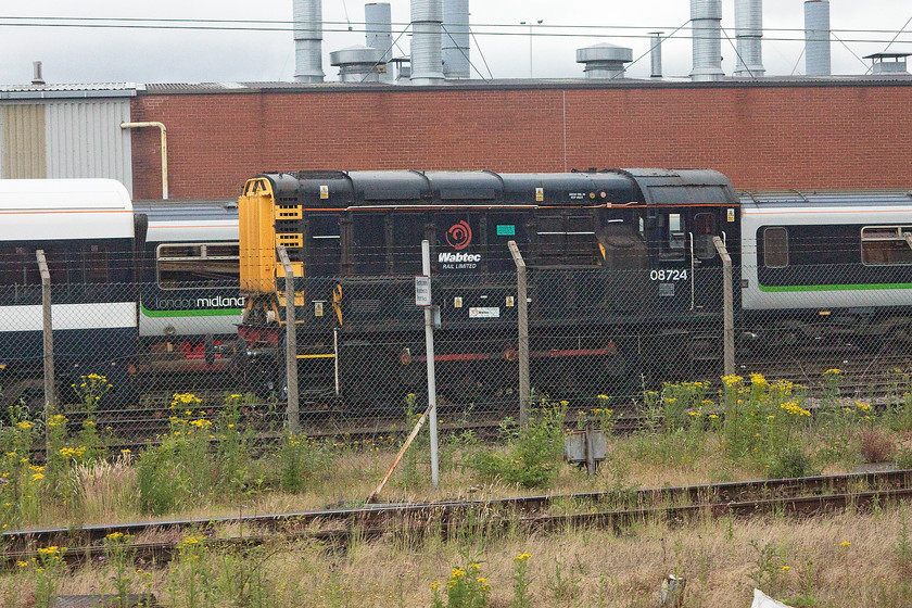 08724, stabled, Doncaster yard 
 One of Wabtec's resident shunters waits in the yard at its Doncaster complex. 08724 was built at Crewe in 1960 and started off its working life on the Scottish Region. It then moved to March and finally Stratford before being acquired by the Doncaster facility. 
 Keywords: 08724 Doncaster yard